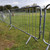 ZND Crowd Control Barrier Fixed Leg 2.3 Metre, metal crowd control barrier with fixed legs placed on green grass outdoors.