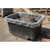 Excelsior 250 Litre Forklift Mortar Tub Black Recycled, black plastic mortar tub with a plastic lining and current construction site surroundings.