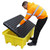 Romold BP2FW 2 Drum Bunded Spill Pallet 230ltr Sump, a black plastic spill containment pallet with a grid surface being placed on a yellow spill containment base by a worker in high-visibility jacket.