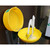 Emtez Wall Mounted Covered Emergency Eye Wash Basin CSE580, yellow mounted eye wash station with water flowing into the basin for safety and first aid.