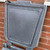 Excelsior 100kg 200L Coal Store Bunker Dark Stone Grey Plastic, close-up of a sturdy, textured plastic coal storage bunker mounted on a brick wall for storing coal securely.