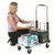 GPC Compact Lightweight Folding Platform Tolley 150kg Load, woman handling boxes on a mobile cart with folding platform and sturdy wheels.