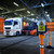 Skipper 27m Belt Barrier Kit With 4 Posts, safety barrier with orange posts blocking a loading bay area in an industrial warehouse.