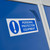 QMP 1800x300x300mm 3 Door PPE Locker, blue metal safety storage cabinet with personal protection equipment warning label.