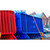 ZND Colour Powder Coated Crowd Control Barrier, colorful powder-coated crowd control barriers in red and blue stacked outdoors for event security.