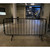 ZND Colour Powder Coated Crowd Control Barrier, black metal crowd control barrier in an indoor setting.