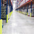 Beaverswood Rack Armour® Upright Racking Protectors, yellow rack protectors installed at the base of warehouse shelving to prevent damage from forklifts.
