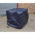 Fentex 4 Drum Bund Flexible Rain Cover BPSE4/RC, a protective waterproof cover for outdoor drums, shown covering a large container on a paved surface against a brick wall.