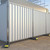 ZND Galvanised Anti-Climb Solid Hoarding Fence Panel, sturdy white metal fence with vertical ridges for security and anti-climb features.