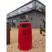 Red Darcy large 90 Litre park dog waste bin outside vets