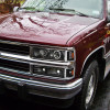 1994-1998 Chevrolet C/K 1500 2500/Tahoe Dual Halo Projector Headlights With Bumper and Corner Signal Lights (Matte Black Housing/Clear Lens)