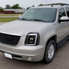 2007-2014 GMC Yukon/XL 1500/XL 2500 Switchback Sequential LED Turn Signal Projector Headlights (Jet Black Housing/Clear Lens)