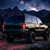 2000-2006 Chevrolet Suburban / Tahoe GMC Yukon / Yukon XL LED C Bar Tail Lights (Black Housing / Smoked Lens)