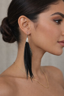 Feather Earrings 5-6 Inch Black Saddle Silver Cone on model side