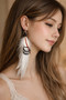 Feather Earrings 5 Inch White Saddle  LA Tippet on model side view