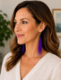 Purple feather earrings four inch featuring polished black onyx beads on model side view