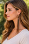 Handmade Feather Earrings – 7.5 Inch Long Natural Mix with Tiger Eye Gemstones on model side view