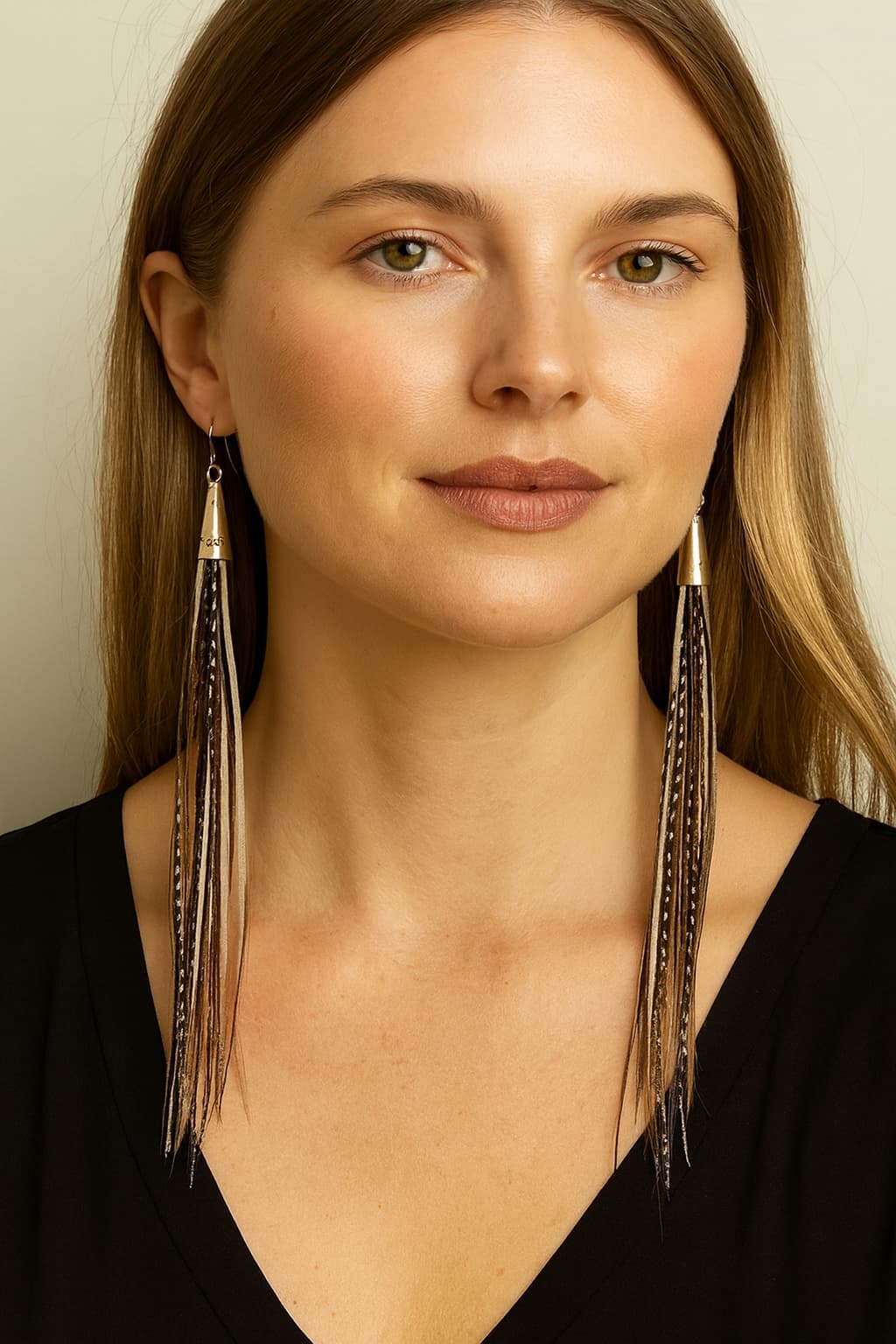Lightweight, natural feather earrings crafted by hand