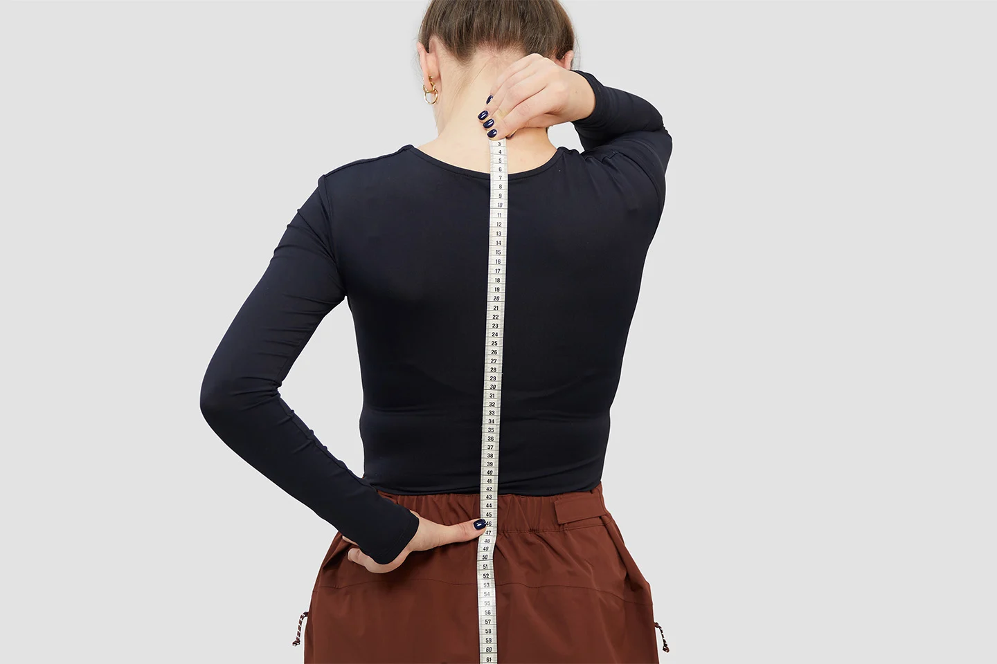 Measuring torso length with a tape measure