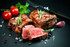cooked Filet Mignon Steaks with flaky salt and green garnish