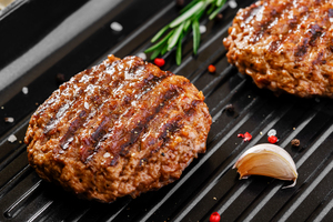 burgers on grill