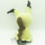 Back view of authentic Japanese import Mimikyu Attack Version plush showing the lightning bolt wood tail detail.