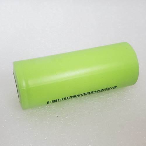 Arizer Air MAX Battery laying on its side on white background