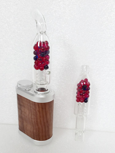 Tinymight 2 in Walnut with Curved Mouthpiece Pirl Pill BotL V2 deployed and Straight Mouthpiece variant standing on right.  All on white background Tinymight 2 in Walnut with Curved Mouthpiece Pirl Pill BotL V2 deployed and Straight Mouthpiece variant standing on right.  All on white background