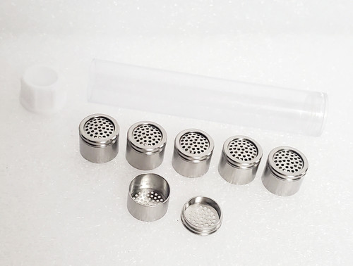 Dosing Capsule 6 Pack for the Arizer Solo/AirSeries removed from Plastic Storage Tube in background with white cap in upper left corner.  5 Dosing Capsules in middle row with caps and an individual cap in front with cap removed to show internals of the capsules.   Dosing Capsule 6 Pack for the Arizer Solo/AirSeries removed from Plastic Storage Tube in background with white cap in upper left corner.  5 Dosing Capsules in middle row with caps and an individual cap in front with cap removed to show internals of the capsules.