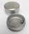 Top two pieces of grinder behind catch plate with filter insert and bearing.  All on white background