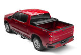 Lund 958294 - Genesis Elite Tri-Fold Tonneau - 2019-2024 Chevrolet Silverado 1500/GMC Sierra 1500; Fits 8.0 Ft. Bed