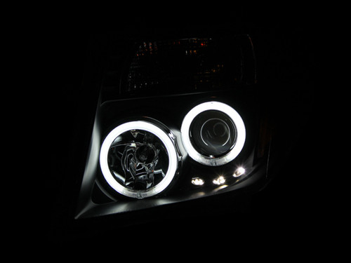Anzo 111111 - 2005-2008 Nissan Frontier Projector Headlights w/ Halo Black Anzo 111111 - 2005-2008 Nissan Frontier Projector Headlights w/ Halo Black