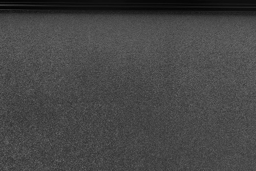 Lund 969364 - 15-18 Ford F-150 Styleside (5.5ft. Bed) Hard Fold Tonneau Cover - Black