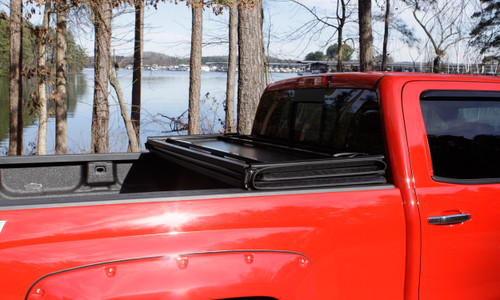 Lund 969364 - 15-18 Ford F-150 Styleside (5.5ft. Bed) Hard Fold Tonneau Cover - Black