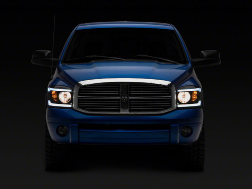 Raxiom R131480 - 06-09 Dodge RAM 1500/2500/3500 Axial Headlights w/ SEQL LED Bar- Blk Housing (Clear Lens)