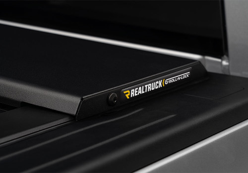 Roll-N-Lock RC220E - 14-17 Chevy Silverado/Sierra 1500 68in E-Series Retractable Tonneau Cover