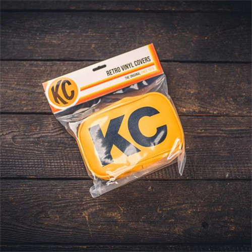 KC HiLiTES 5601 - Retro 5in x 7in Rectangular Yellow Vinyl Light Cover w/ Black KC Logo (Pair)