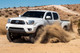 Icon 58735E-700 - 2005-2023 Toyota Tacoma, 2.5 VS Extended Travel, Remote Reservoir w/ CDEV Coilover Kit, 700 lbs/in Coils