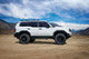 Icon 54102G - 22-23 Toyota Tundra / 2024 Toyota Tacoma Billet Rear Upper Link Kit - Gold Anodized