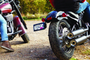 Kuryakyn 3142 - Nova Side Mount License Plate Frame Gloss Black