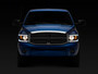 Raxiom R131480 - 06-09 Dodge RAM 1500/2500/3500 Axial Headlights w/ SEQL LED Bar- Blk Housing (Clear Lens)
