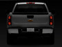 Raxiom S122507 - 01-13 Chevrolet Silverado/GMC Sierra 1500 Axial Series LED License Plate Lamps- Smoked