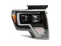 Raxiom T546755 - 09-14 Ford F-150 Axial G4 Light Bar Switchback Projector Headlights- Blk Housing (Clear Lens)