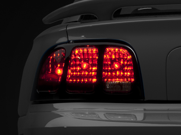 Raxiom 49124 - 96-98 Ford Mustang Tail Lights- Black Housing (Smoked Lens)