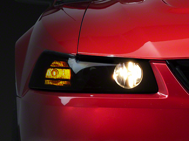 Raxiom 49126 - 99-04 Ford Mustang Axial Series Projector Headlights- Blk Housing (Smoked Lens)