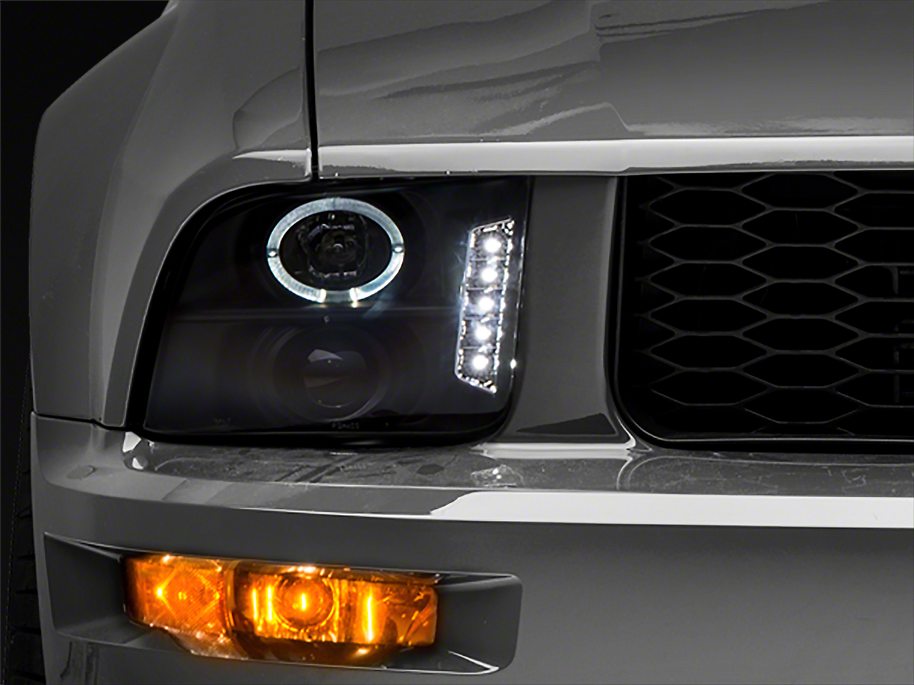 Raxiom 101683 - 05-09 Ford Mustang Excluding GT500 LED Halo Projector Headlights- Blk Housing (Clear Lens)