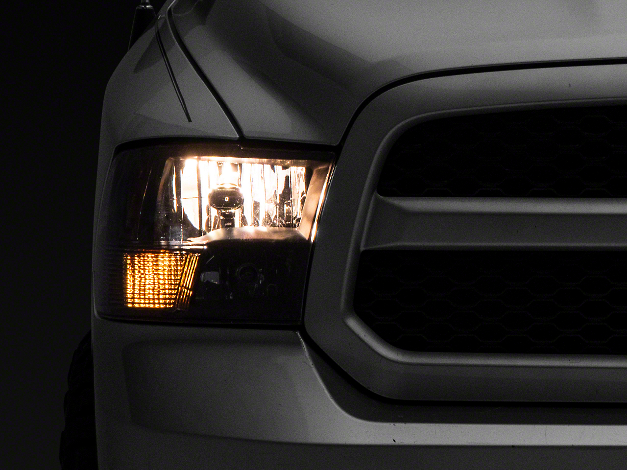 Raxiom R118016 - 09-18 Dodge RAM 1500 Axial Series Euro Style Headlights w/ Dual Bulb Blk Housing (Clear Lens)