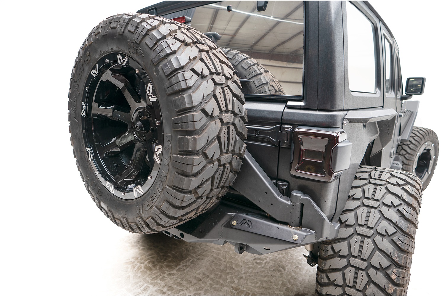 Fab Fours JL18-Y1851T-1 - Off The Door Tire Carrier Fab Fours JL18-Y1851T-1 - Off The Door Tire Carrier