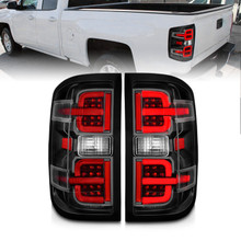 Anzo 311425 - 15-19 Chevy Silverado 2500HD/3500HD (Halgn Only) LED Tail Lights w/Black Light Bar & Clear Lens