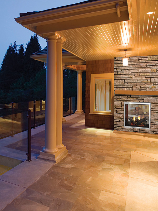 two sided fireplace indoor outdoor family room on Fortress See Through